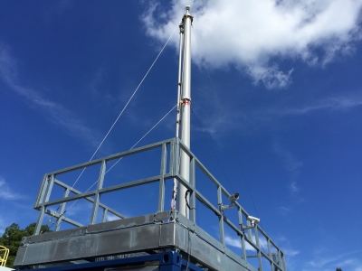A twenty-foot tall pipe, called the stack, atop a new Aerosol Observing System shelter, which is nearly ready for its first deployment to ARM’s third mobile facility (AMF3) in Oliktok, Alaska.