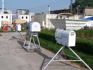 Radiometers (forefront), a radar wind profiler (right), and instrument shelters (background) from the ARM Mobile Facility were prepared for their deployment in Shouxian, China.