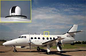 Outside  the hangar in Ponca City, Oklahoma, the optical head of the AATS-14 (inset) can be seen as the white dome on the roof of the Jetstream-31 aircraft
