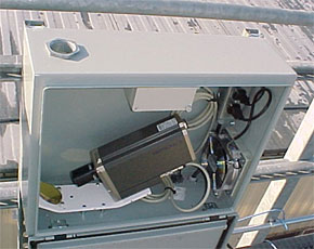 A filtered fan keeps moisture from building up on the mirror surface (bottom left) by circulating air up through the optical port (top left) of the IRT enclosure.