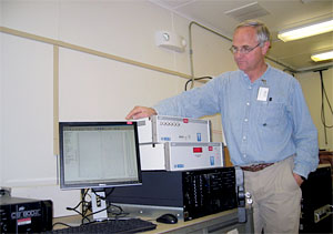 The RWP associate instrument mentor Tim Martin shows the new amplifier, interface, processor, and display of the upgraded 915 MHz RWP at the SGP Central Facility.