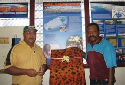 Staff of the Papua New Guinea National Weather Service pose with the soon-to-be-revealed ARM kiosk.