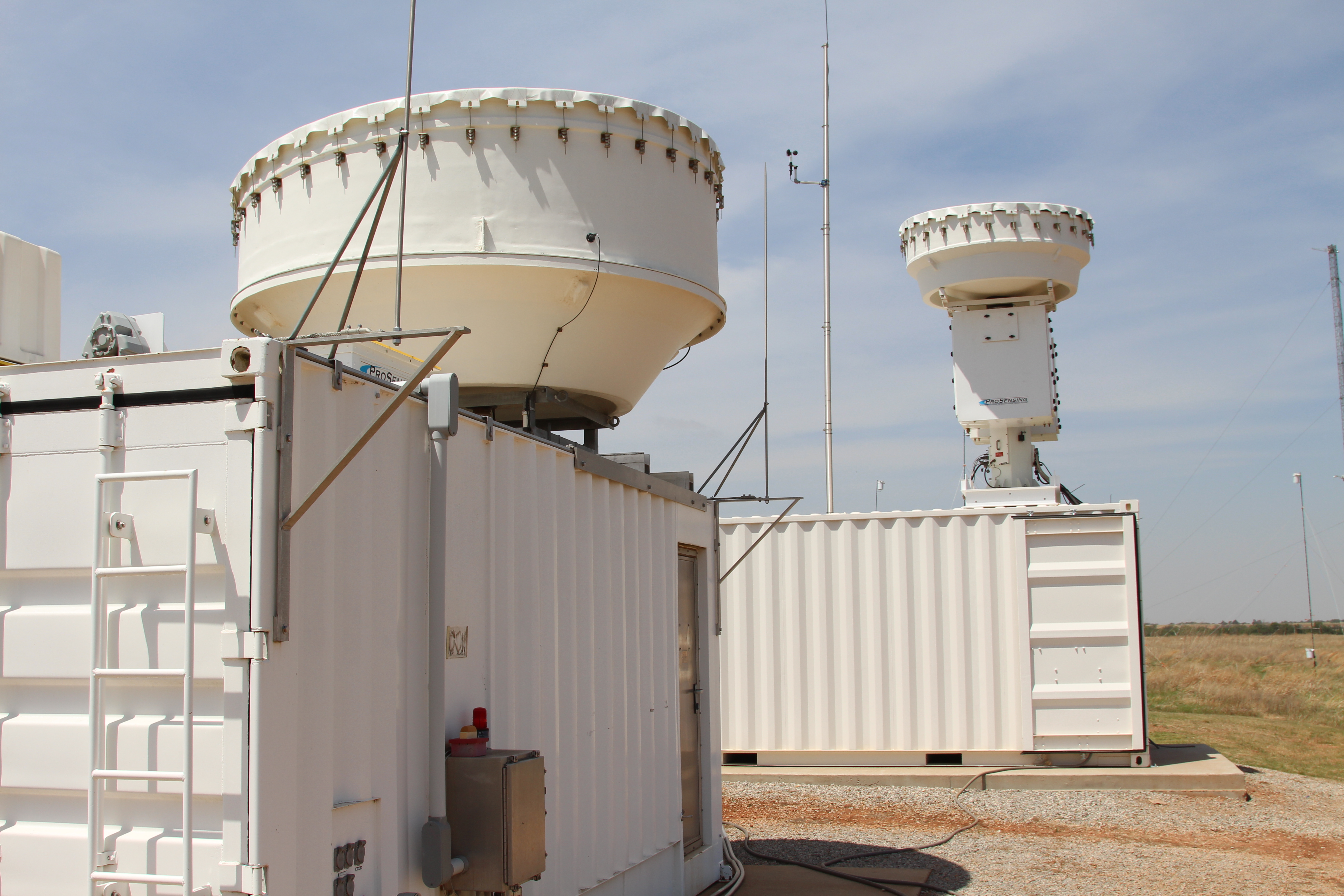 Radar row at the Southern Great Plains Central Facility is a series of radars and lidars used to measure a variety of atmospheric properties.