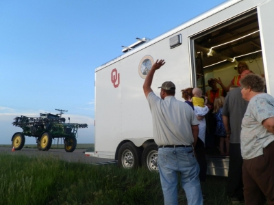 Locals north of Oakley, Kansas, stopped by the trailer on the shakedown mission to watch the CLAMPS team deploy the facility and release a weather balloon.