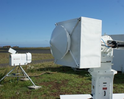 The new scanning radar (foreground) joins the ARM Mobile Facility instrument suite operating on Graciosa Island.