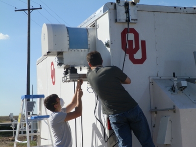 Team members Ben Toms (left) and Greg Blumberg (right) deploying the microwave radiometer upon arrival at the mission deployment location.