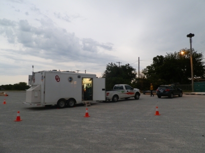 This is the typical deployment structure of the trailer, truck, and scout vehicle. The scout vehicle is placed in front of the trailer with cones wrapping around the exterior of the trailer to ensure cars pass at a safe distance.