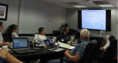 Campaign participants gather in the hangar's conference room on Sunday, April 24: General safety briefing and flight planning for Monday, when HI-SCALE's first research flight is scheduled.