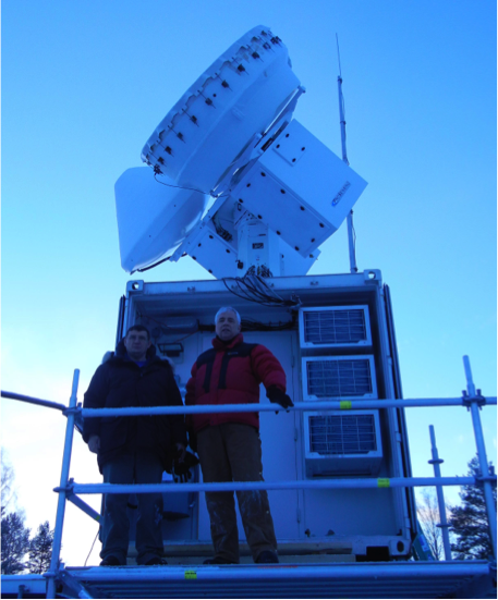 Kevin Widener (in red), seen here with Andrei Lindenmaier in front of the scanning ARM cloud radar, began retired life officially on October 31, 2014.