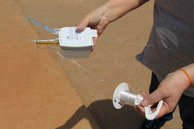 Radiosondes, like this one, are attached to weather balloons to collect vertical profiles (data sets) of both the thermodynamic state of the atmosphere and wind speed and direction.