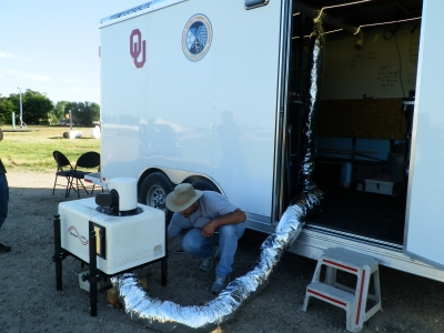 Team leader and co-PI, Dave Turner ensuring the “Super Cool Tube” is diverting enough air-conditioned air toward the lidar.