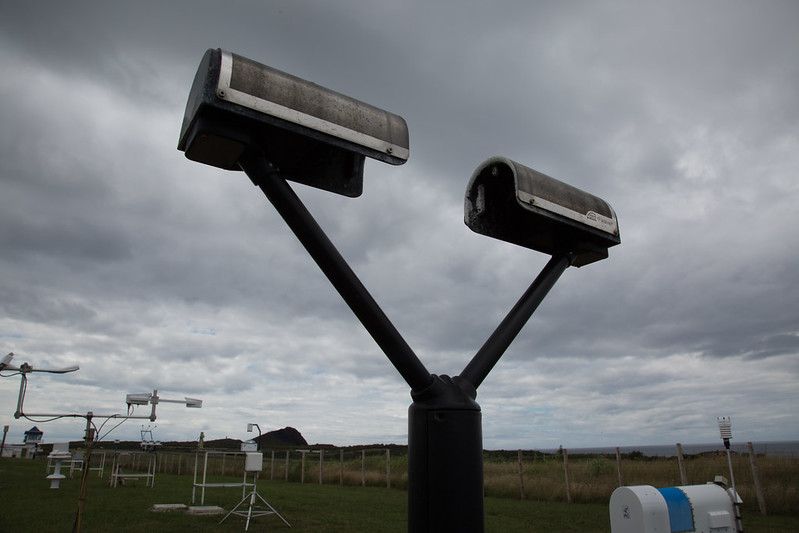 Beneath a gloomy sky, a laser disdrometer stands ready at ARM's Eastern North Atlantic atmospheric observatory.