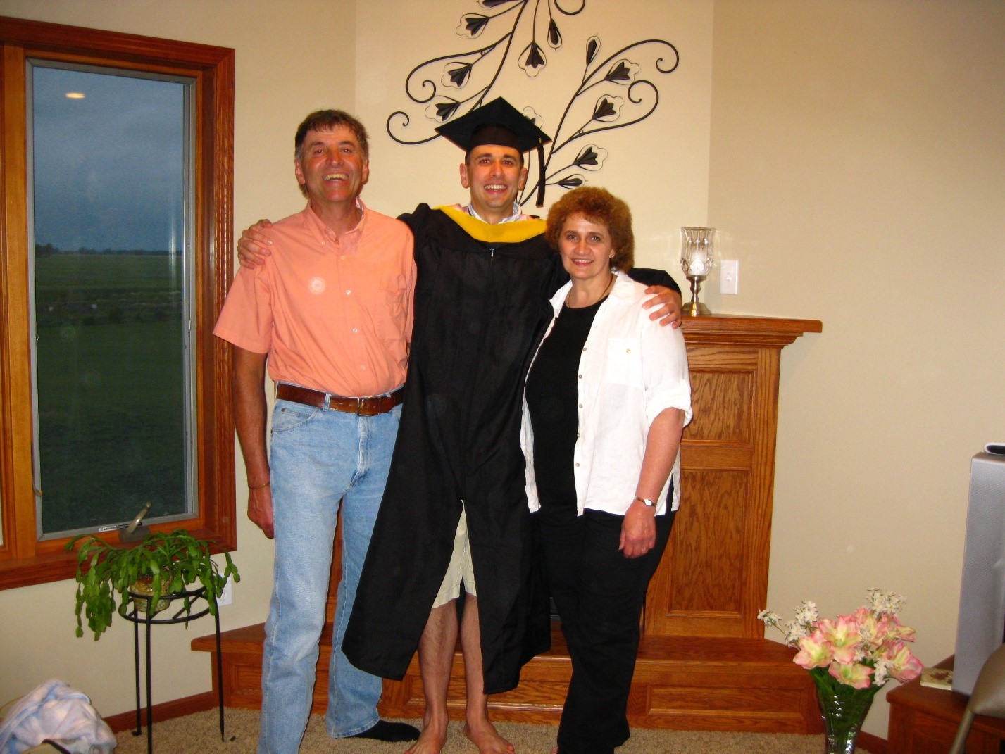 Adam Theisen with his parents