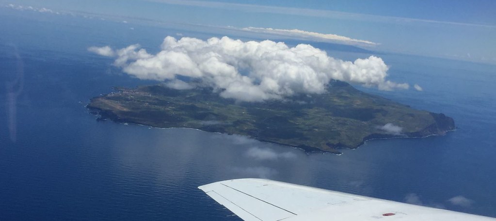 An aerial view shows land-influenced clouds forming over Graciosa Island in the Azores.