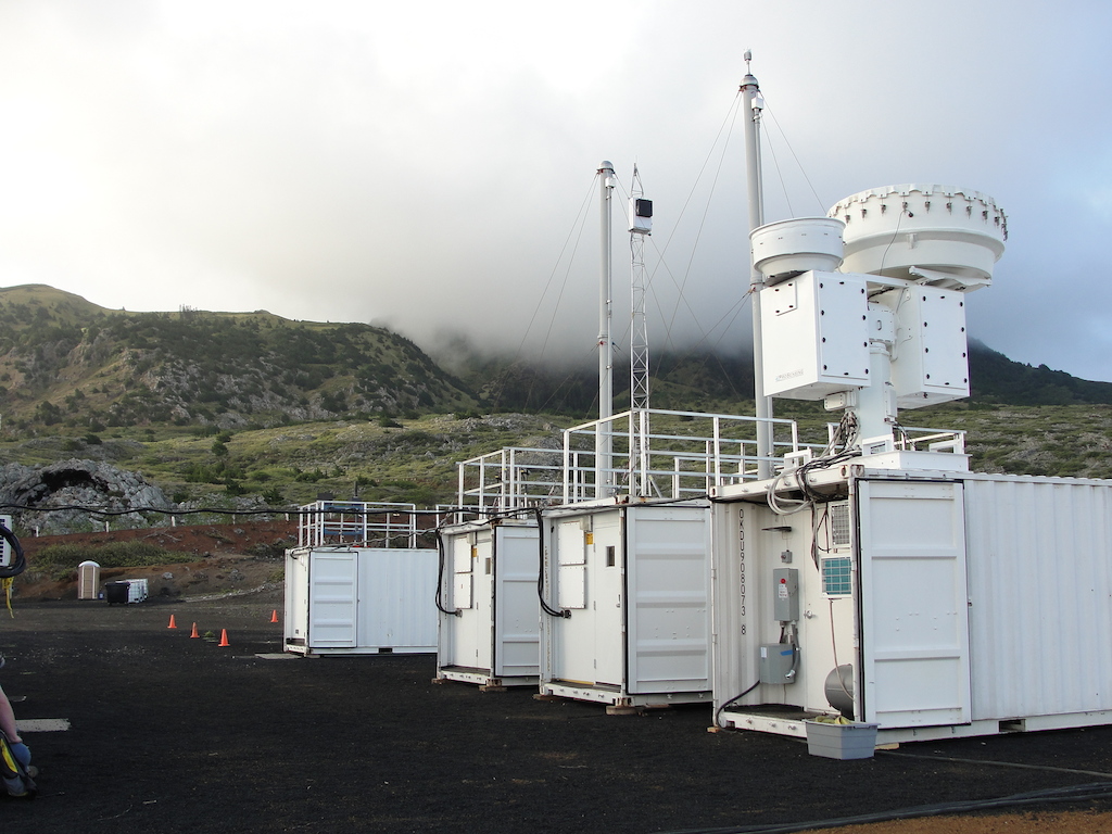 Smoke-filled clouds hover near the ARM Mobile Facility on Ascension Island.