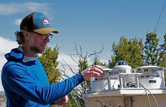 Matthew Shupe with pyranometers and radiometers