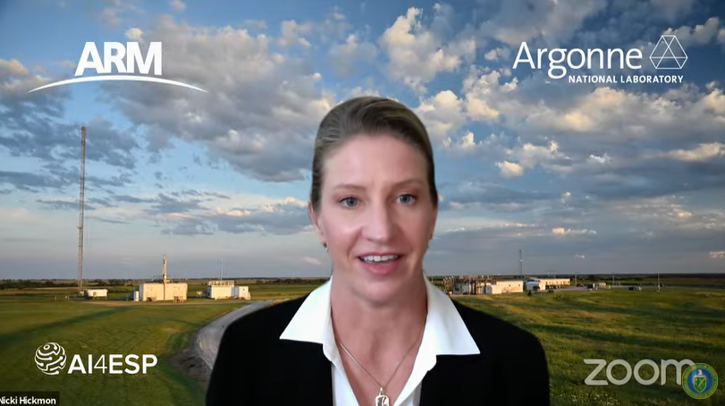 Nicki Hickmon speaks in front of a virtual background featuring ARM's Southern Great Plains atmospheric observatory.