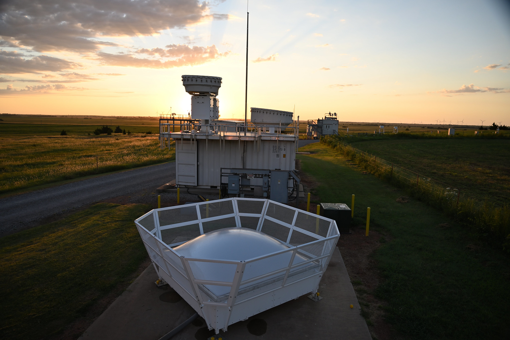 A photo from the Southern Great Plains Central Facility captures the radar wind profiler, Ka-/W-band scanning ARM cloud radar, and Ka-Band ARM Zenith Radar. Photo is by Nicki Hickmon, Argonne National Laboratory.