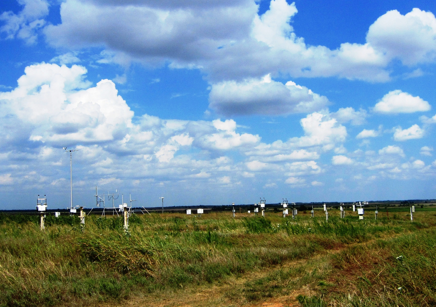 Shallow cumulus clouds float over instruments at the Southern Great Plains atmospheric observatory.