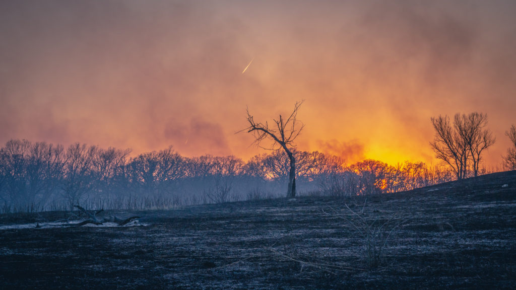 Sunset over a prescribed burn in Kansas