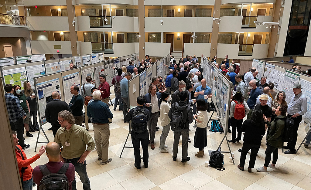 People make their way through rows of posters at the ARM/ASR joint meeting.