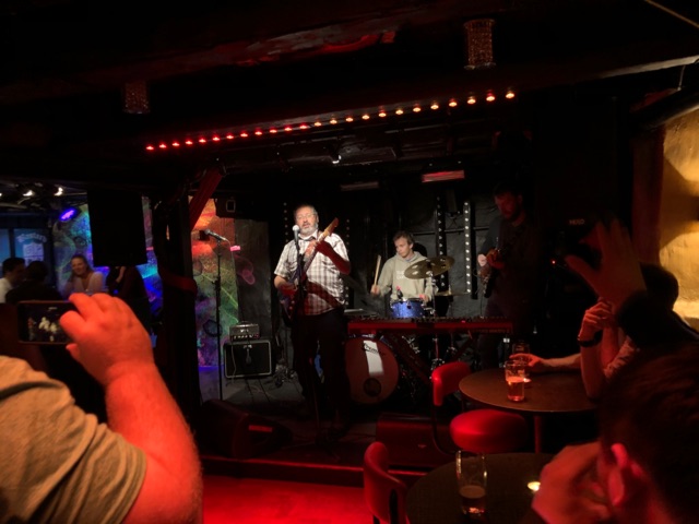 Paul Ortega performs music for a crowd