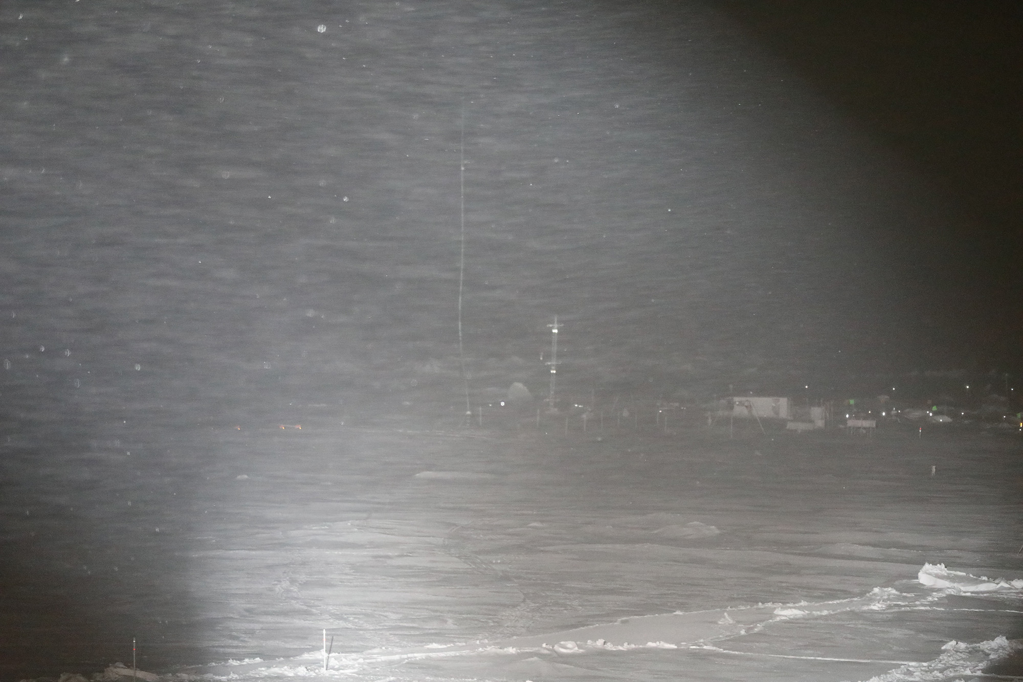 Blowing snow makes it difficult to see instruments on the sea ice during the MOSAiC expedition.