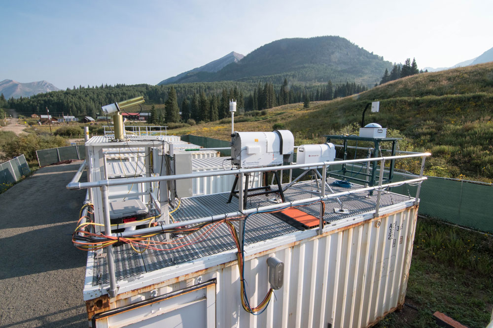 ARM instruments are set up on the roof of an ARM Mobile Facility container in Gothic, Colorado.